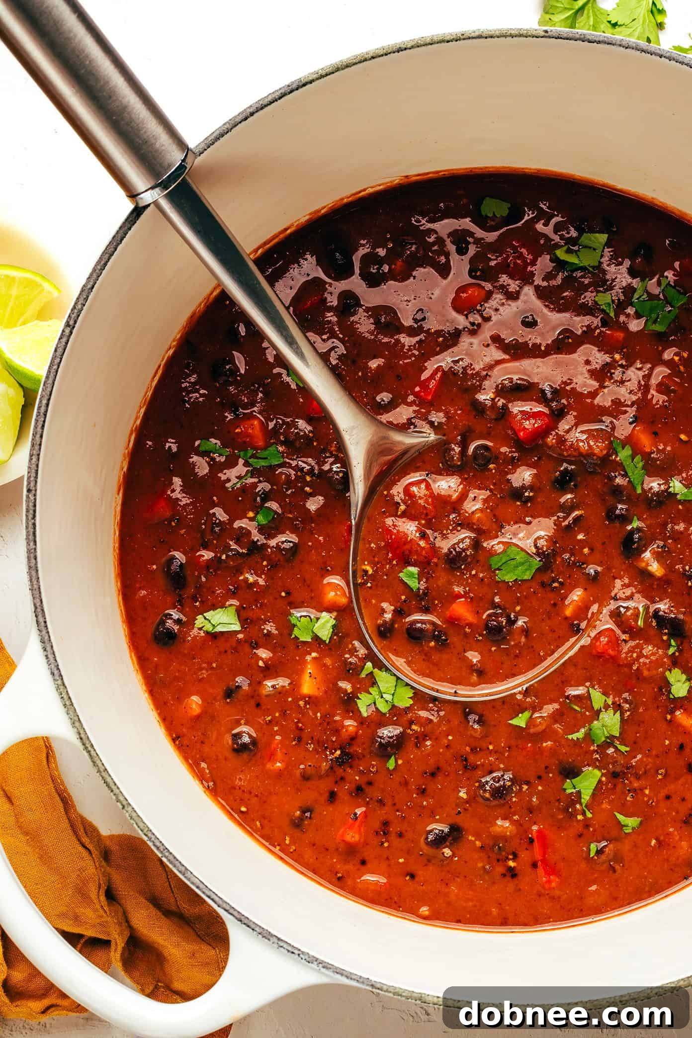 Easy Black Bean Soup simmering in a large pot on the stovetop