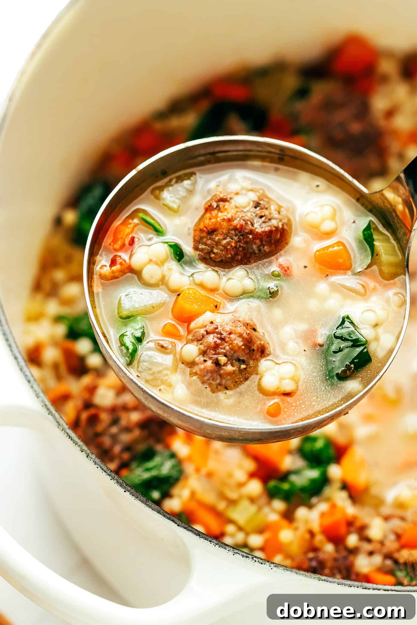 A delicious bowl of homemade Italian Wedding Soup with meatballs and pasta