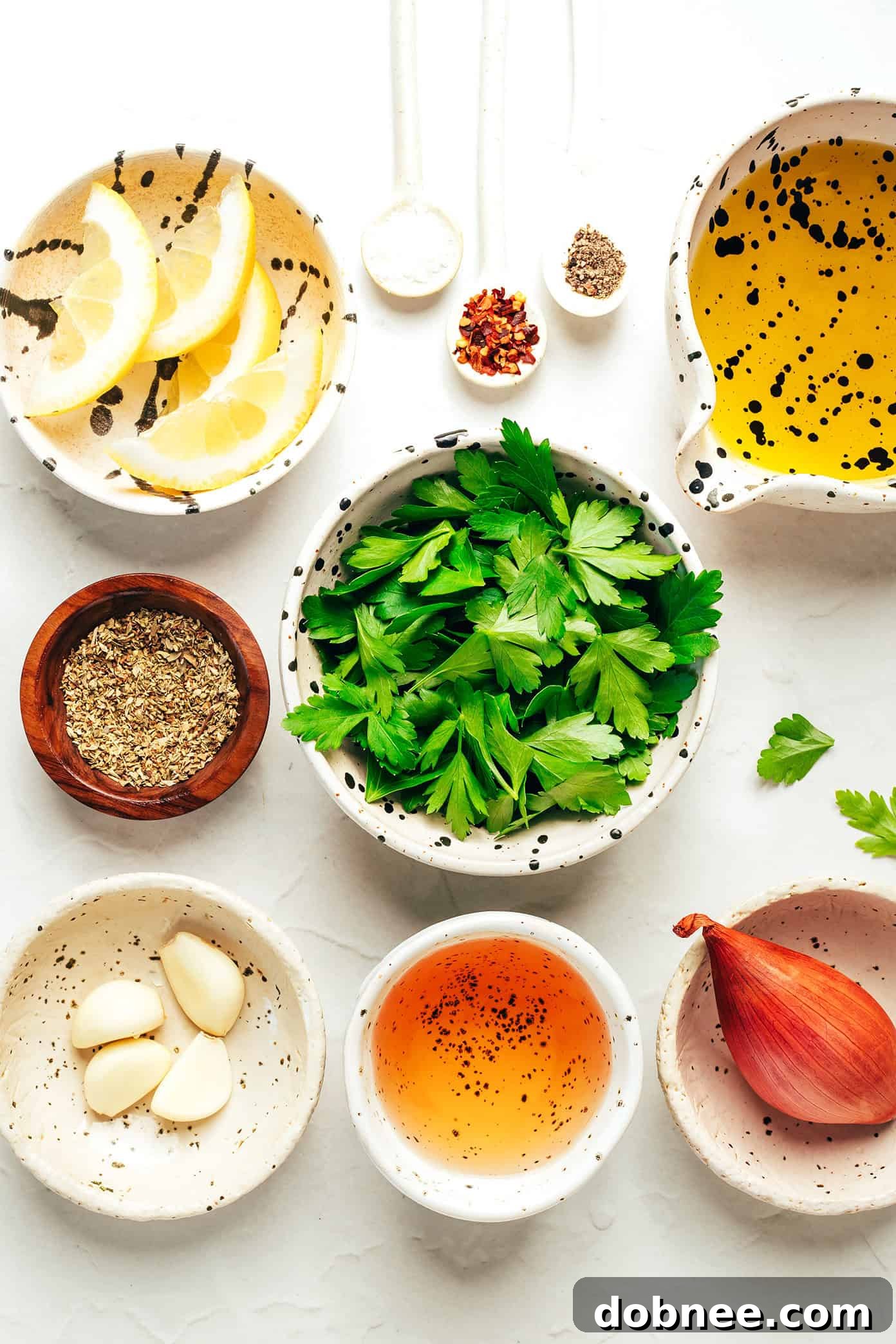 Close-up of vibrant green chimichurri sauce in a bowl, showcasing its fresh ingredients.