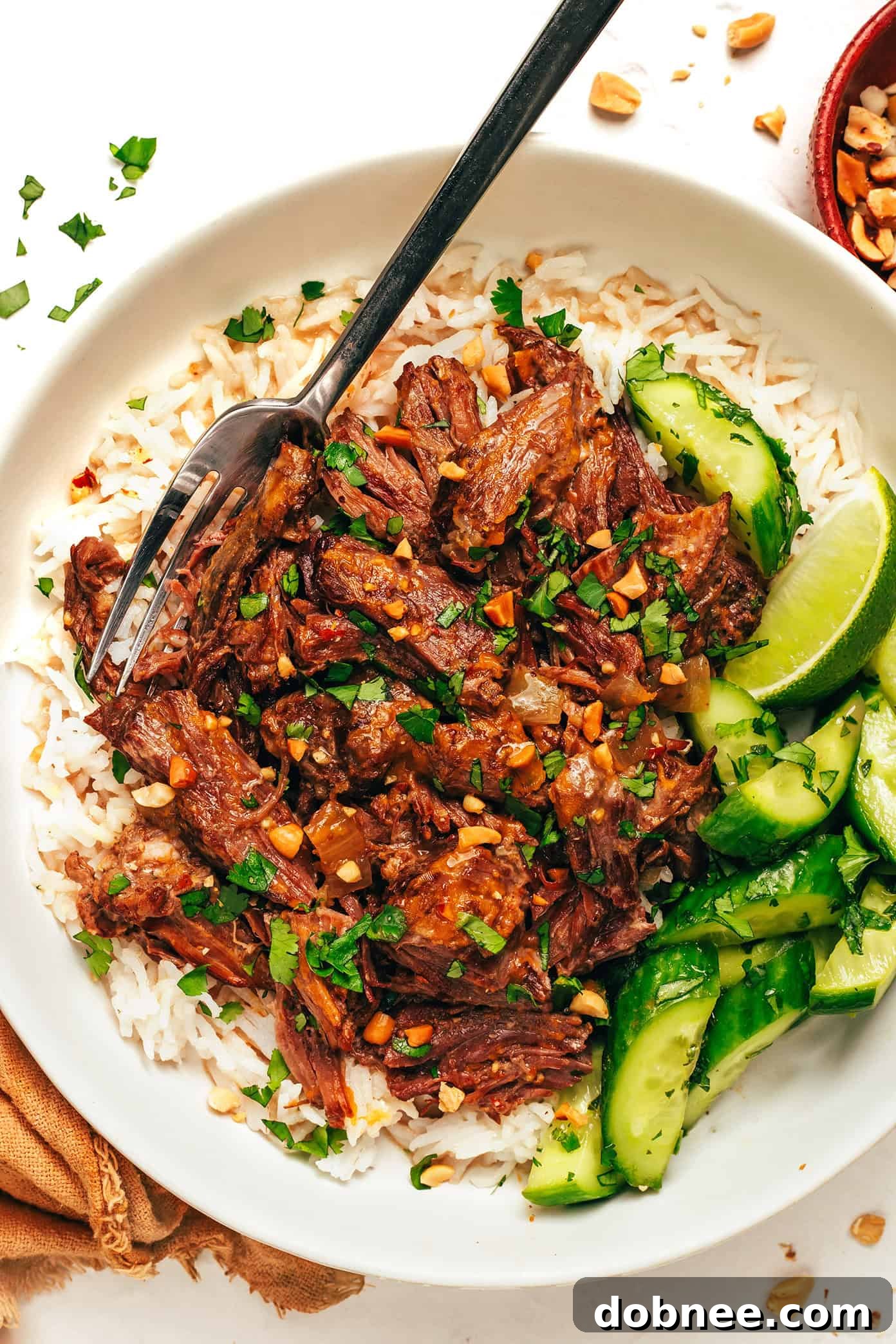 Slow-Cooked Coconut Curry Pulled Beef 5 Ingredients for a Thai red curry, including beef, coconut milk, curry paste, and fresh aromatics.