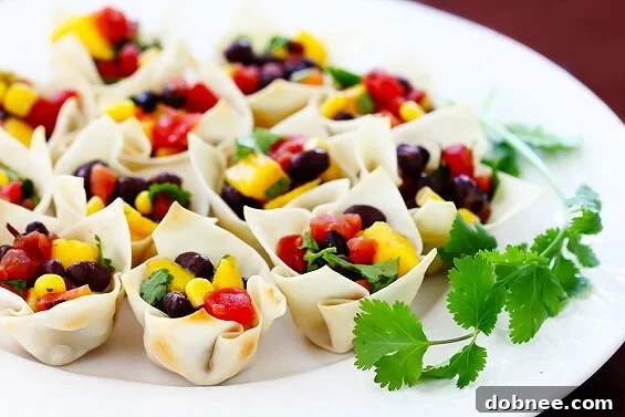Black Bean and Mango Salsa in crisp wonton cups, ready to serve.
