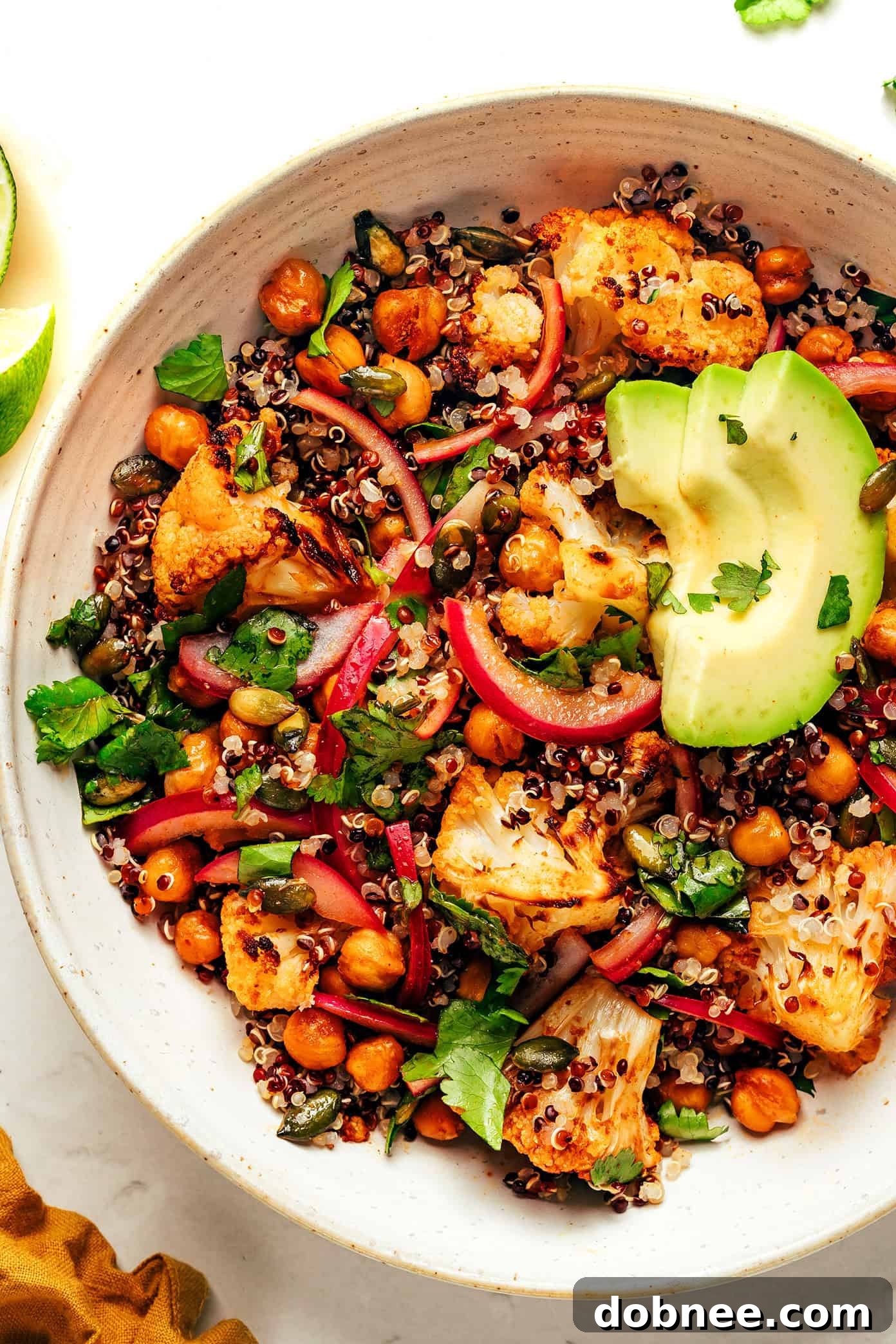 A vibrant bowl featuring all the components mixed together, ready to be enjoyed.