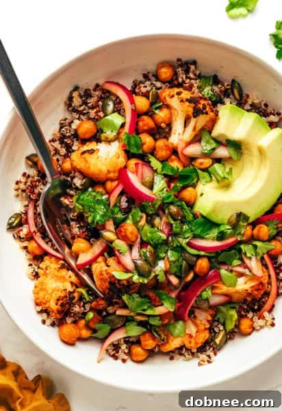 A finished bowl of Chili-Lime Roasted Cauliflower Quinoa Bowls.