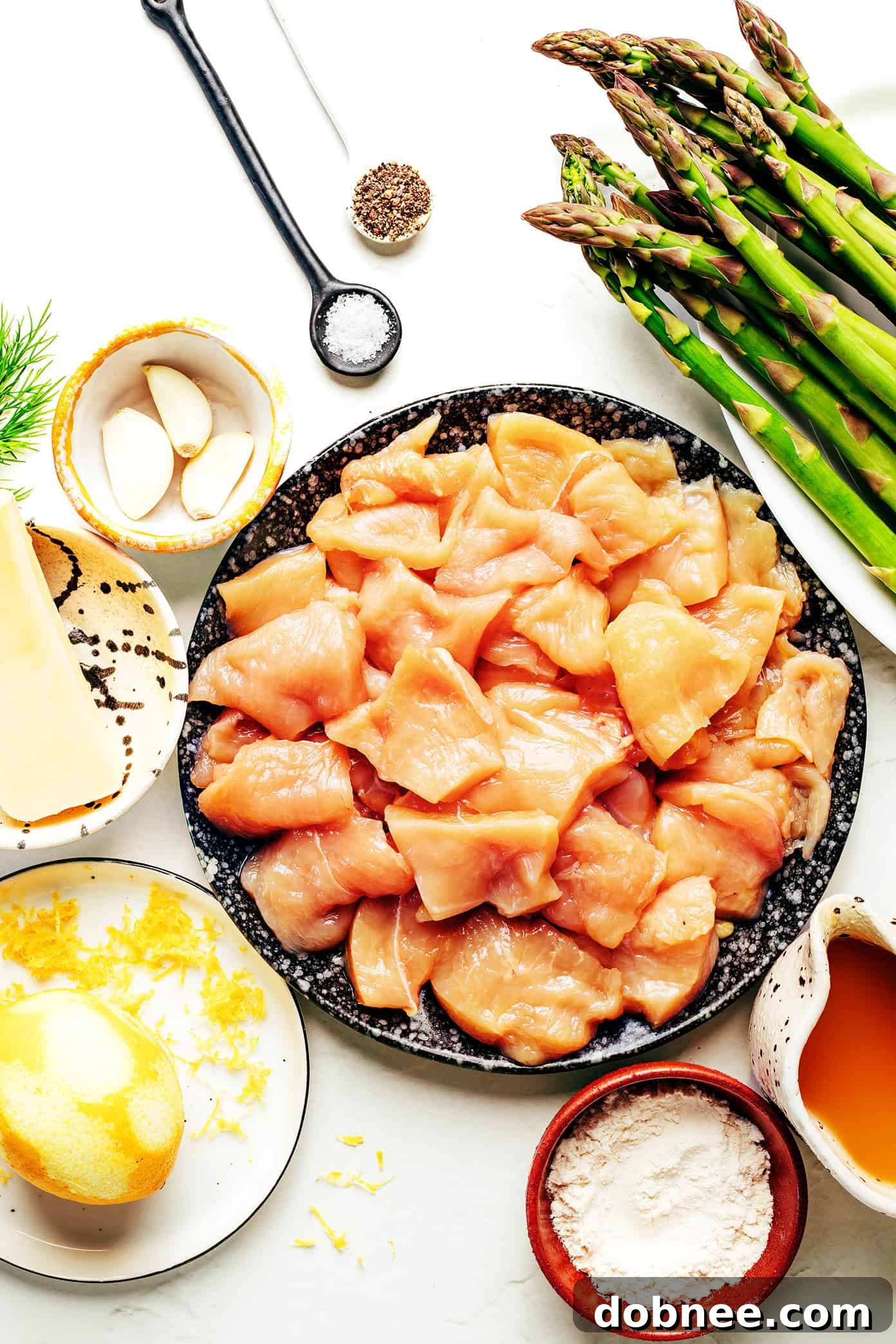 Close-up of Lemon Pepper Chicken and Asparagus Stir-fry with fresh herbs