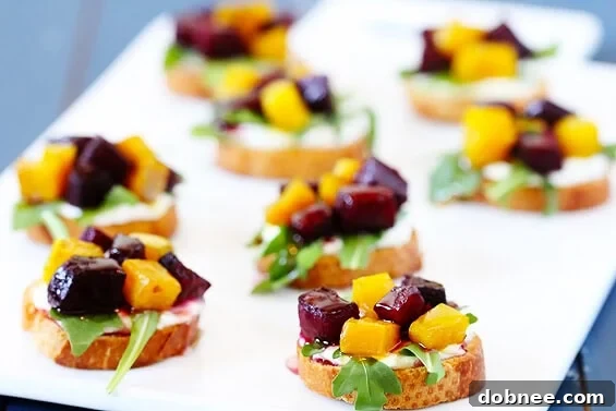 Roasted Beet, Arugula, Goat Cheese & Honey Crostini, a vibrant and healthy appetizer.