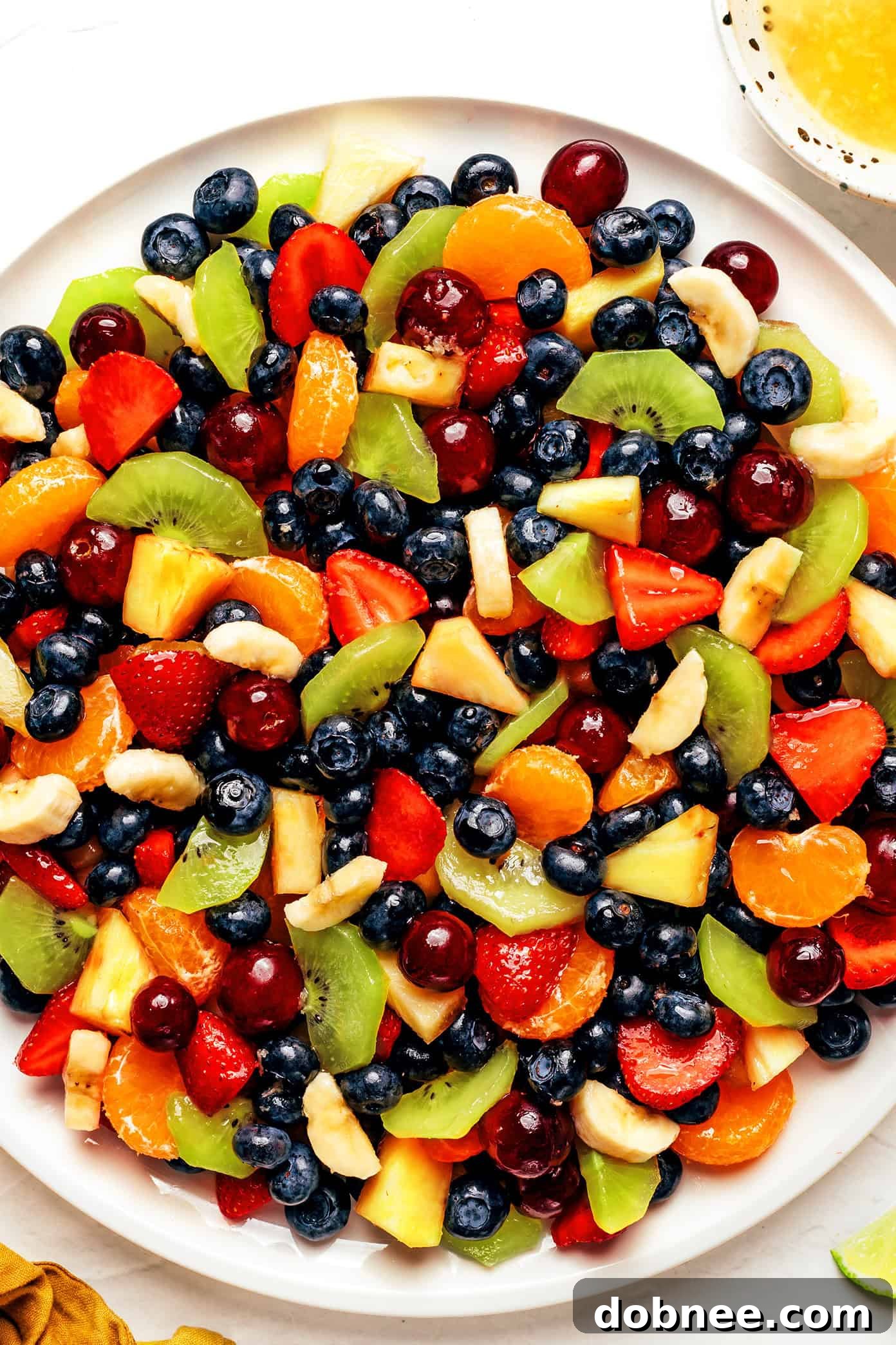 Vibrant Rainbow Fruit Salad with Ginger-Lime Dressing
