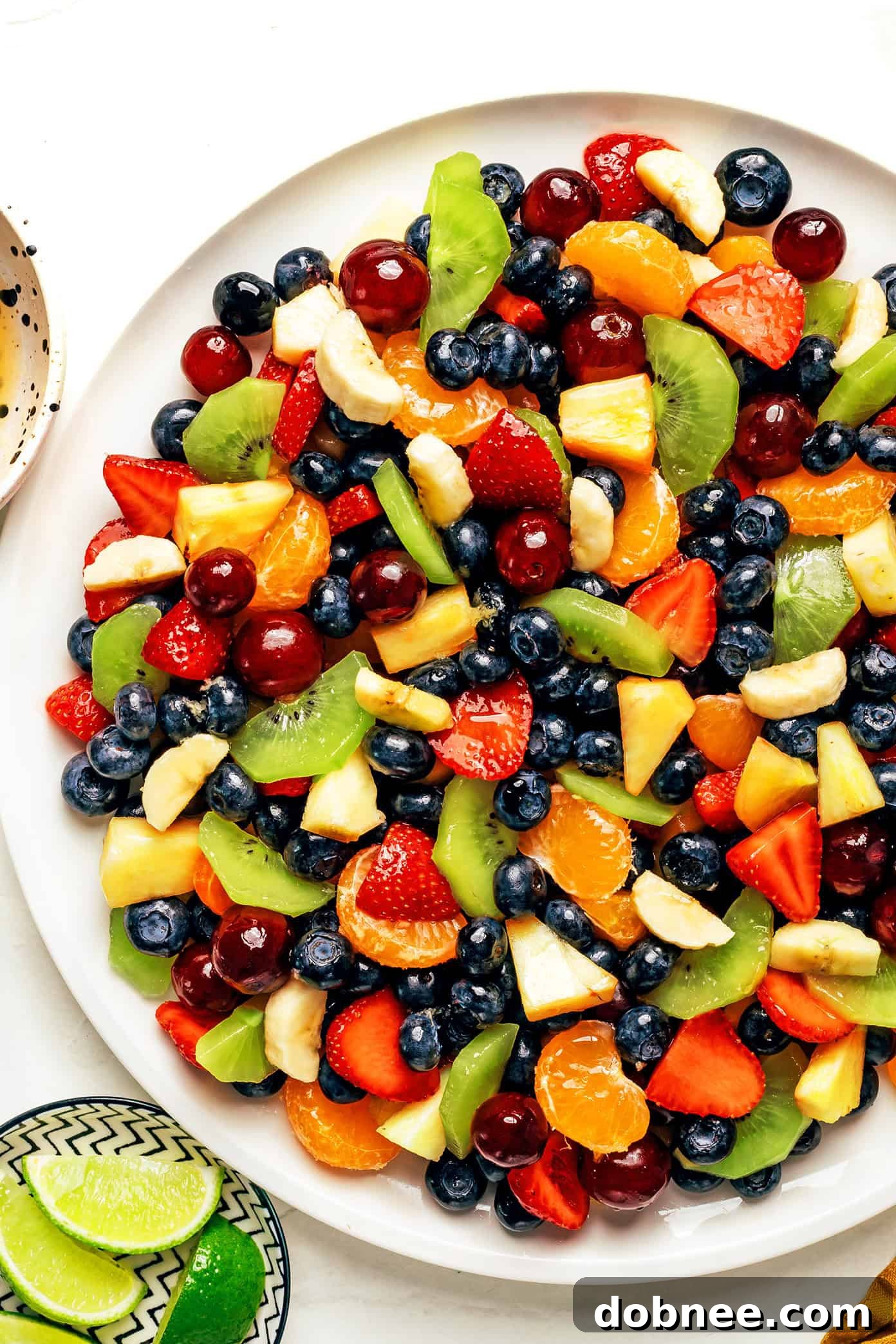 Close-up of fresh fruit salad with ginger lime dressing