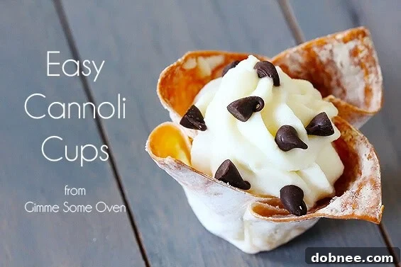 A tray of freshly baked, unfilled wonton cups, perfectly golden brown and crispy.