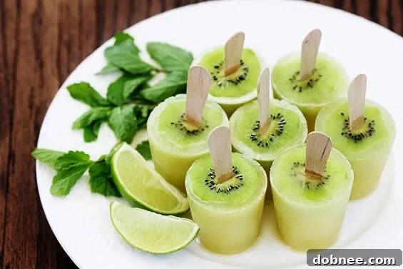 Refreshing Kiwi Mojito Popsicles with fresh mint and lime