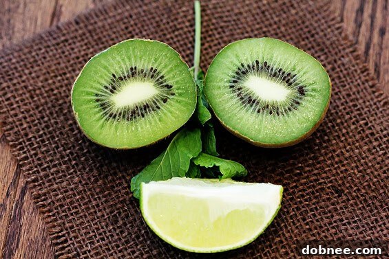Multiple Kiwi Mojito Popsicles arranged artfully on a platter