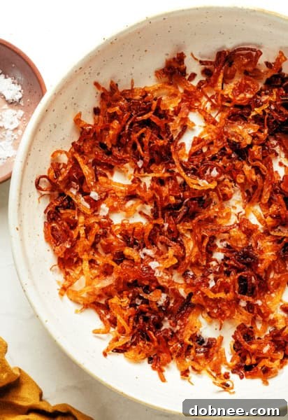 Crispy Fried Shallots ready to be served, showcasing their golden texture and enticing appearance.
