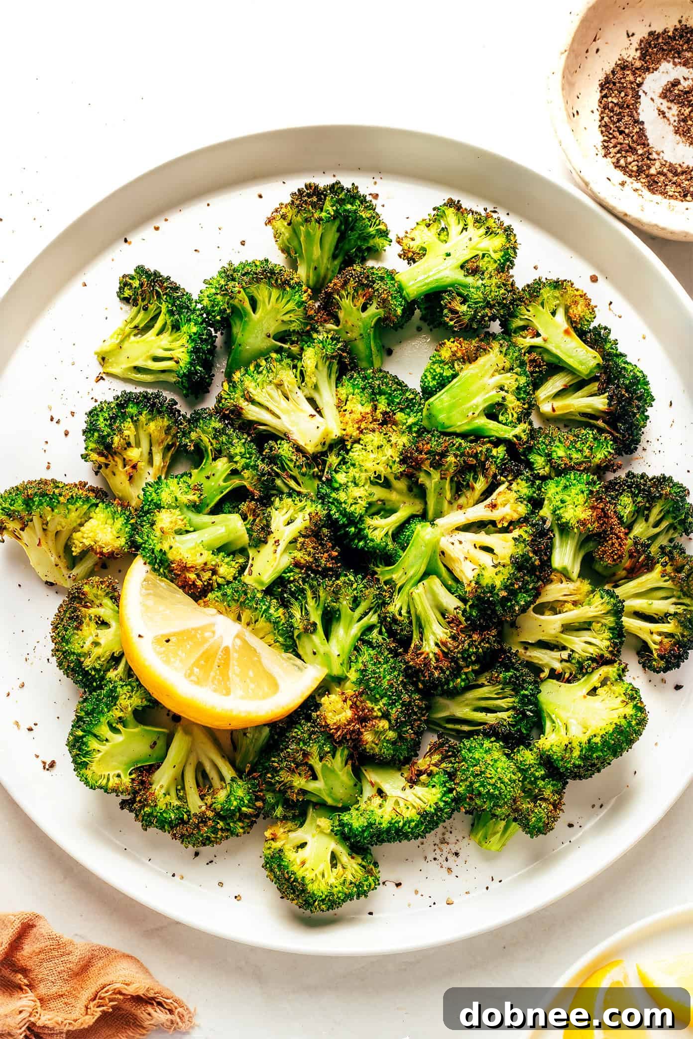 Crispy Air-Fried Broccoli 2 Crispy Air Fryer Broccoli on a plate