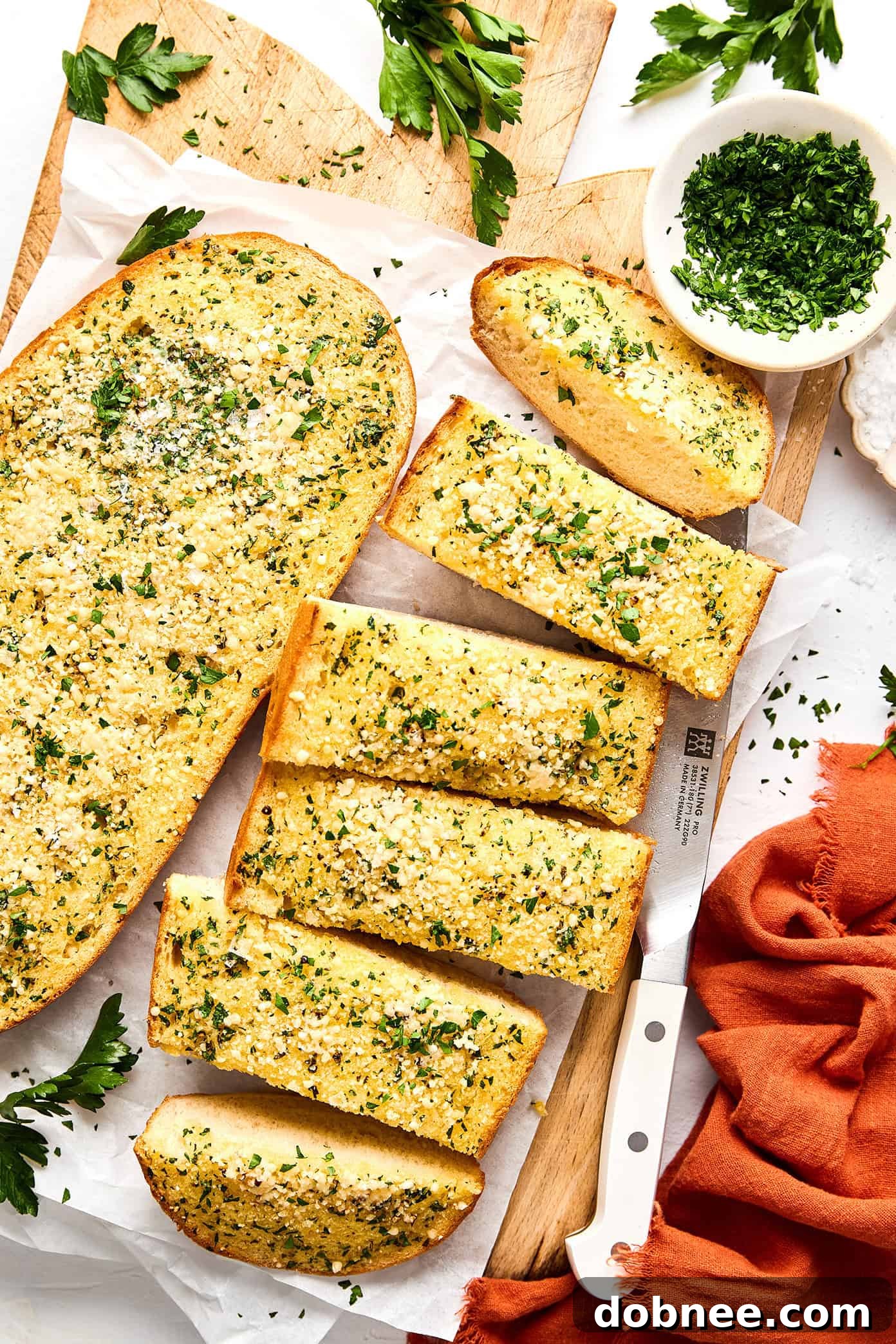 Another close-up shot of garlic bread, showcasing the texture.