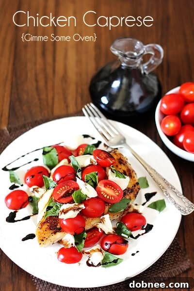 Chicken Caprese | Healthy & Quick Recipe Overhead shot of Chicken Caprese on a white plate, showcasing the vibrant colors of tomatoes, mozzarella, and basil.