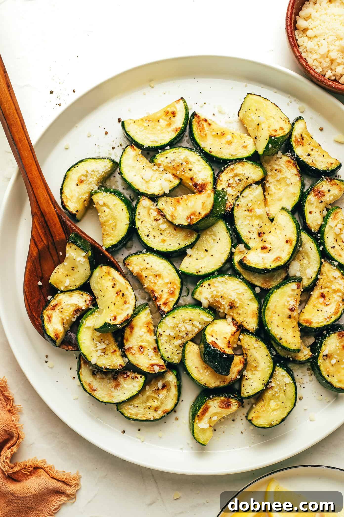 Air Fryer Zucchini in a white bowl, ready to serve