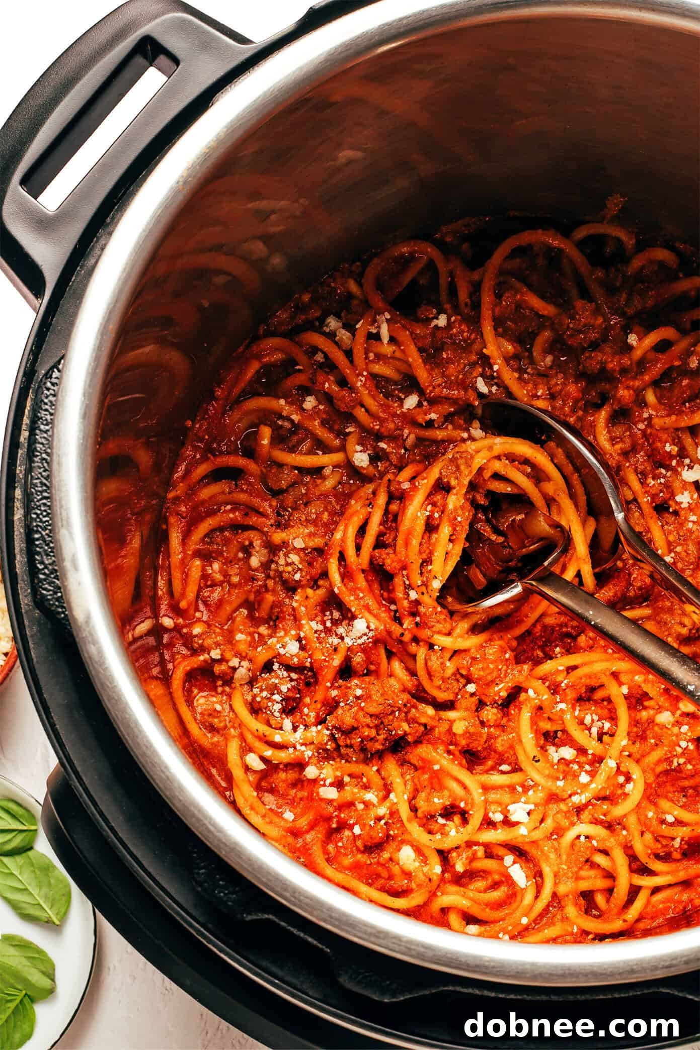 High Protein Instant Pot Spaghetti with fresh basil