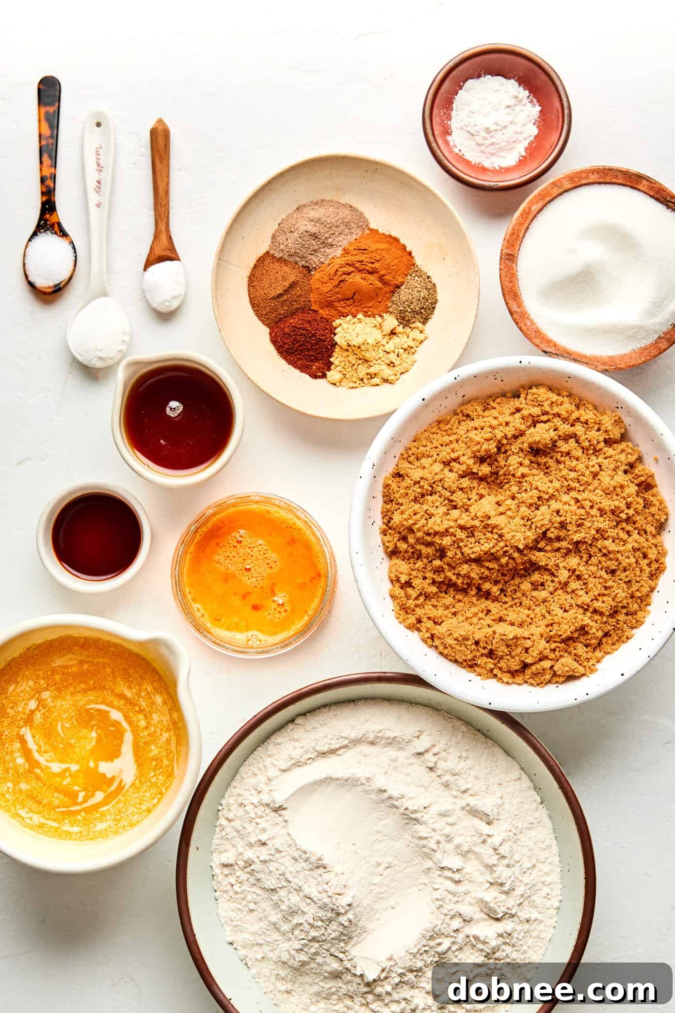 A batch of freshly baked chai cookies cooling on a wire rack.