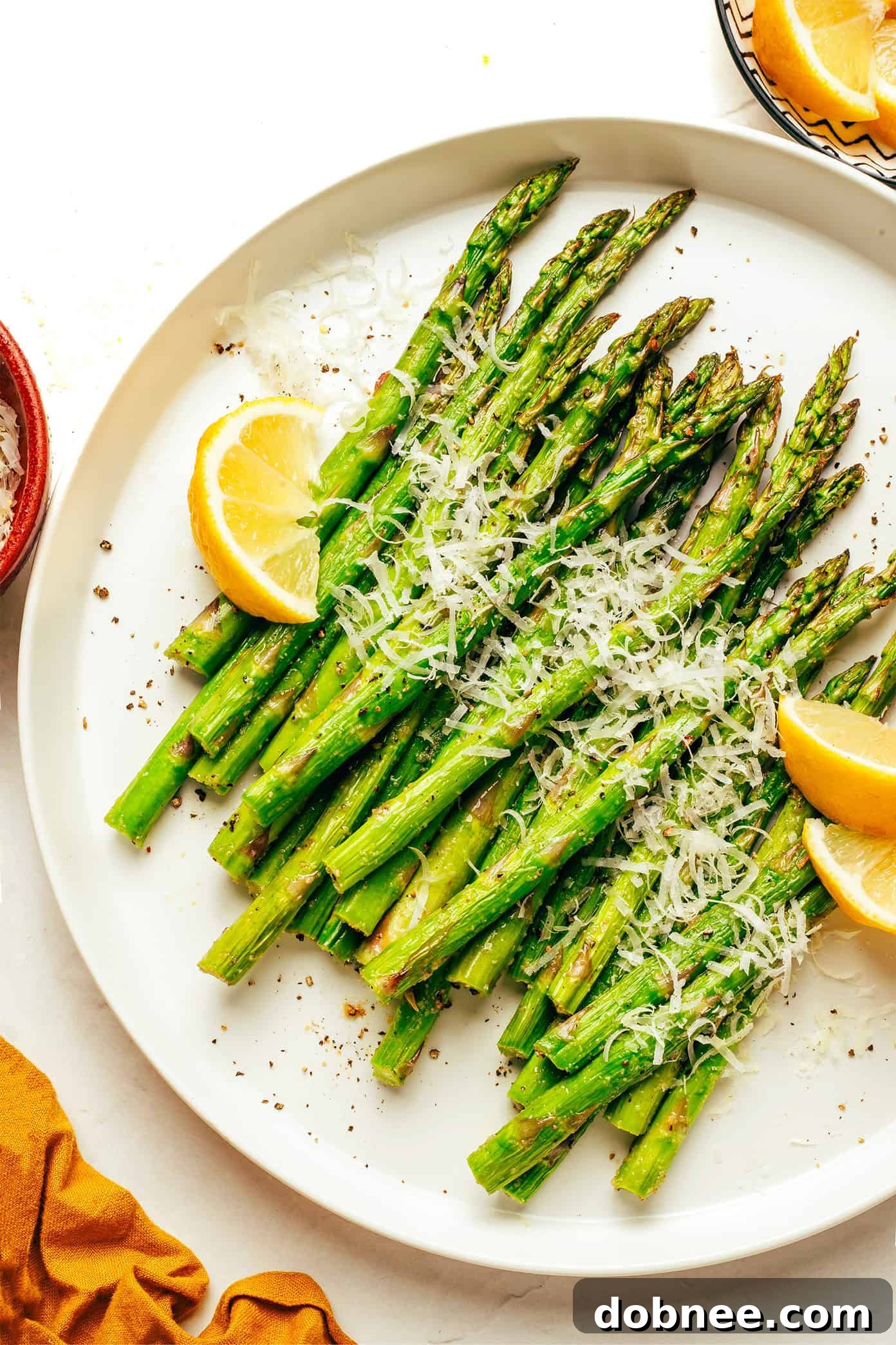 Various side dishes including air fryer asparagus