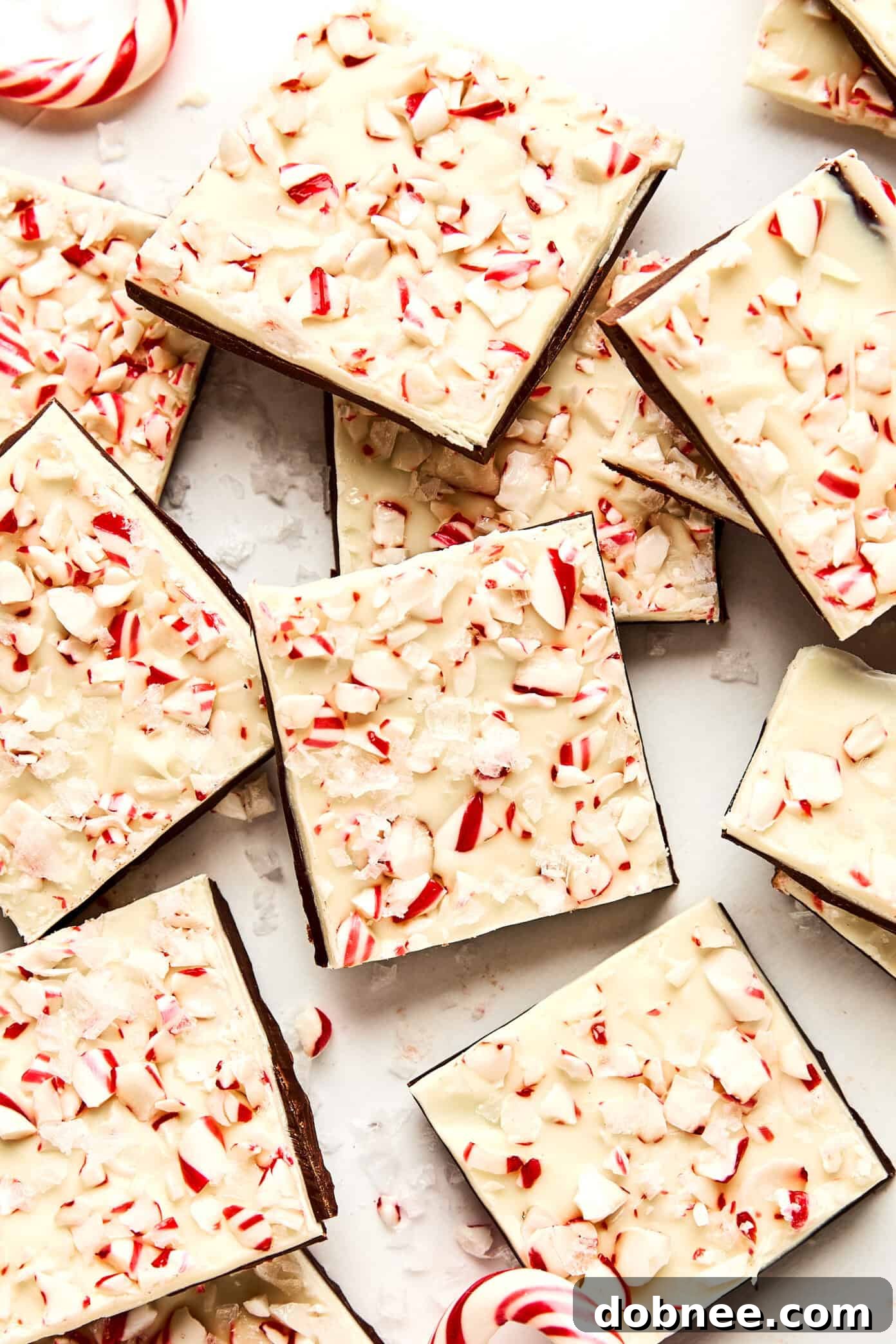 Festive Mint Chocolate Crunch 2 Classic Peppermint Bark layered with dark and white chocolate, topped with crushed candy canes.