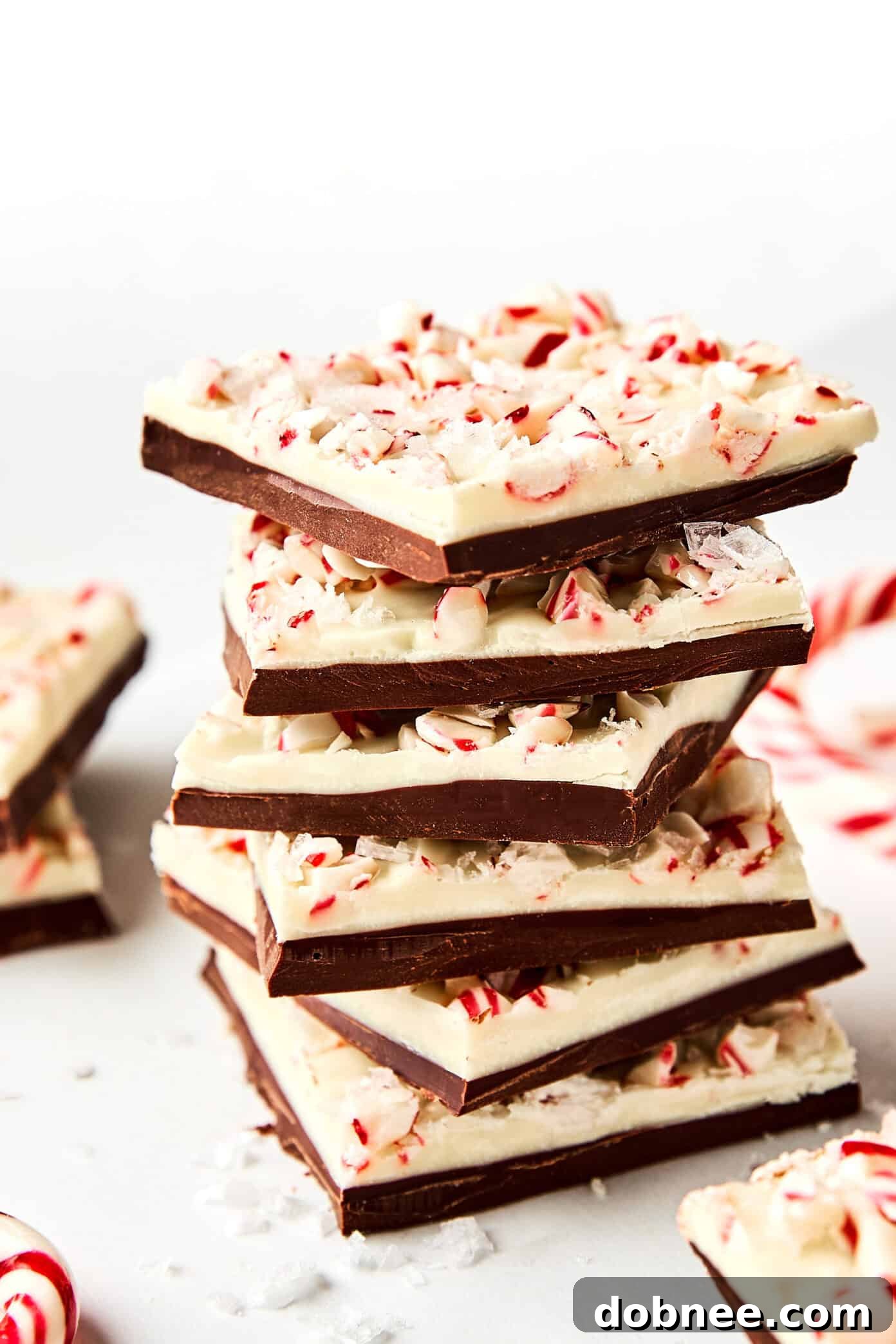 Festive Mint Chocolate Crunch 7 A stack of freshly made peppermint bark pieces, ready for serving or gifting.