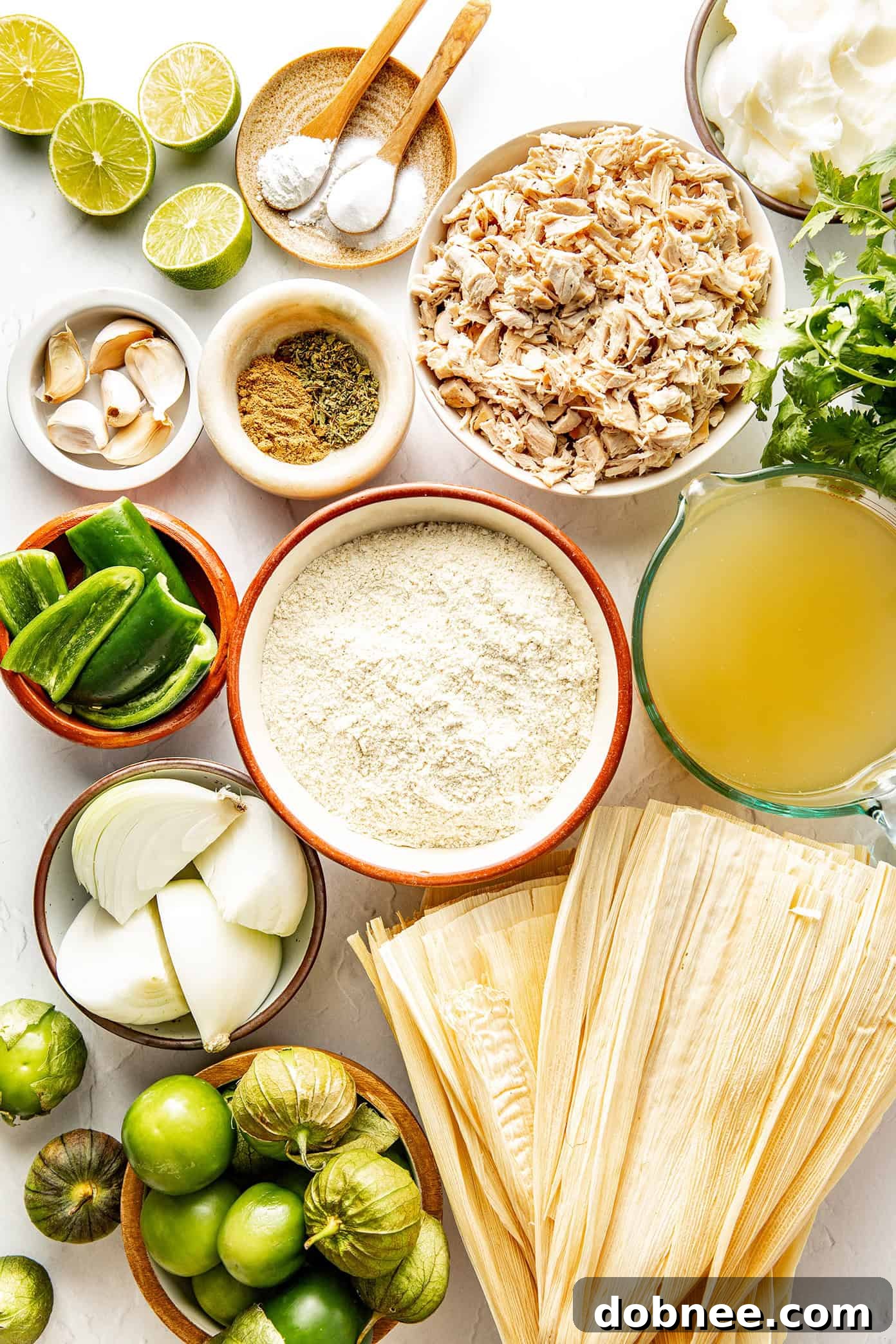 Green Chile Chicken Tamales 4 Fresh ingredients for salsa verde laid out on a baking sheet, ready for broiling