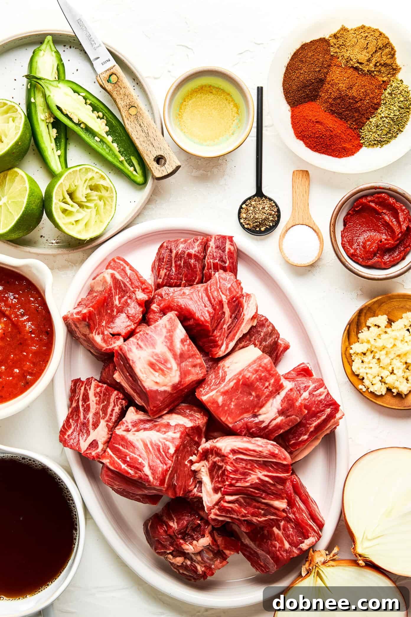 A close-up shot of Texas Chili simmering gently in a large Dutch oven.