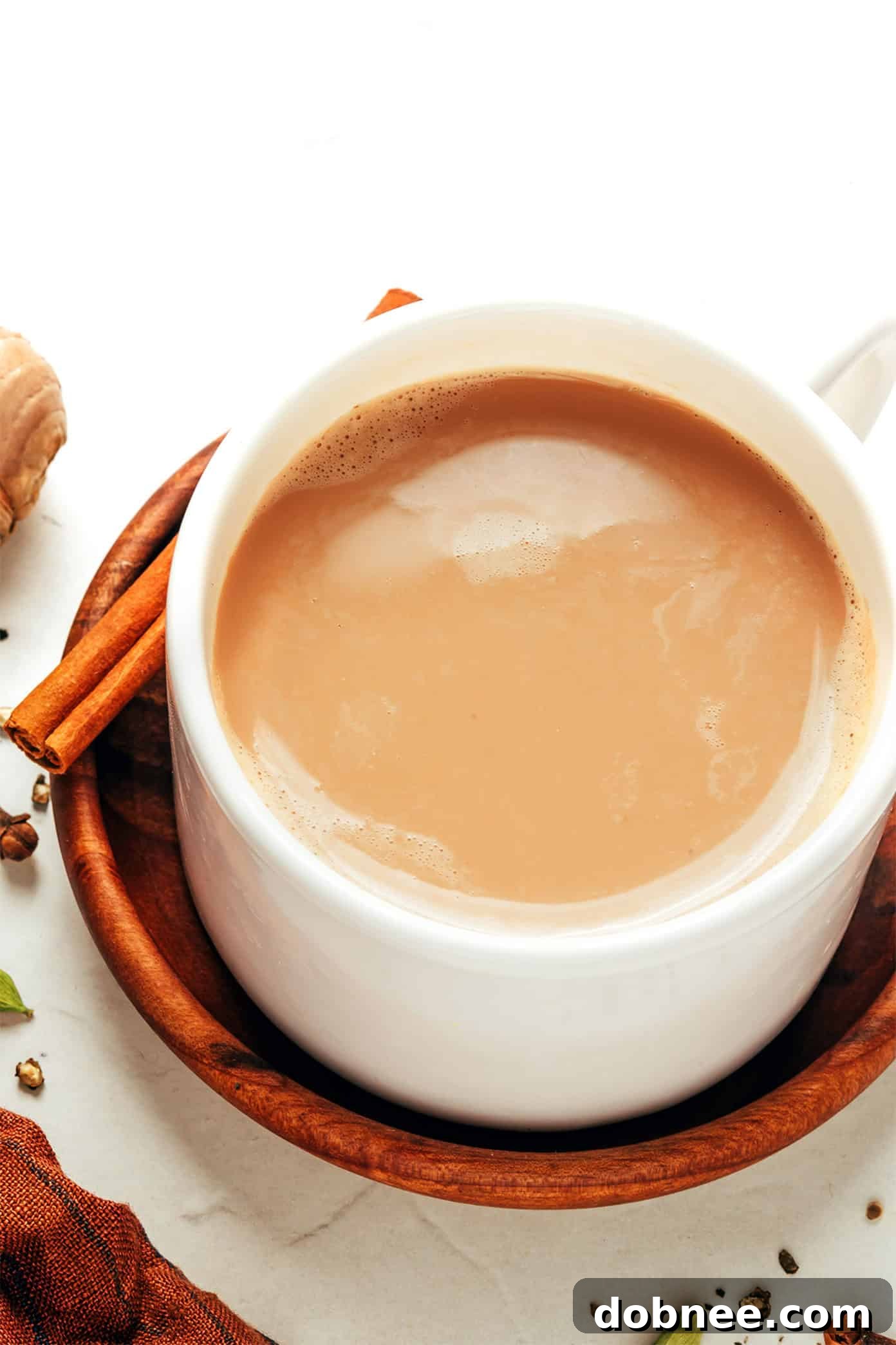 A beautifully presented mug of homemade Masala Chai