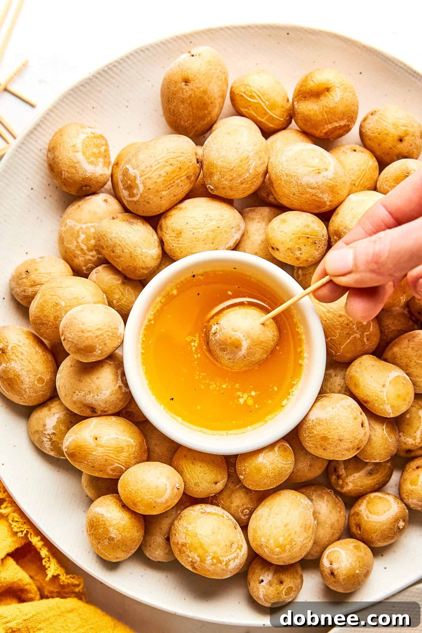 A vibrant platter of Syracuse Salt Potatoes, perfectly boiled with a delicate white salt crust, ready to be served