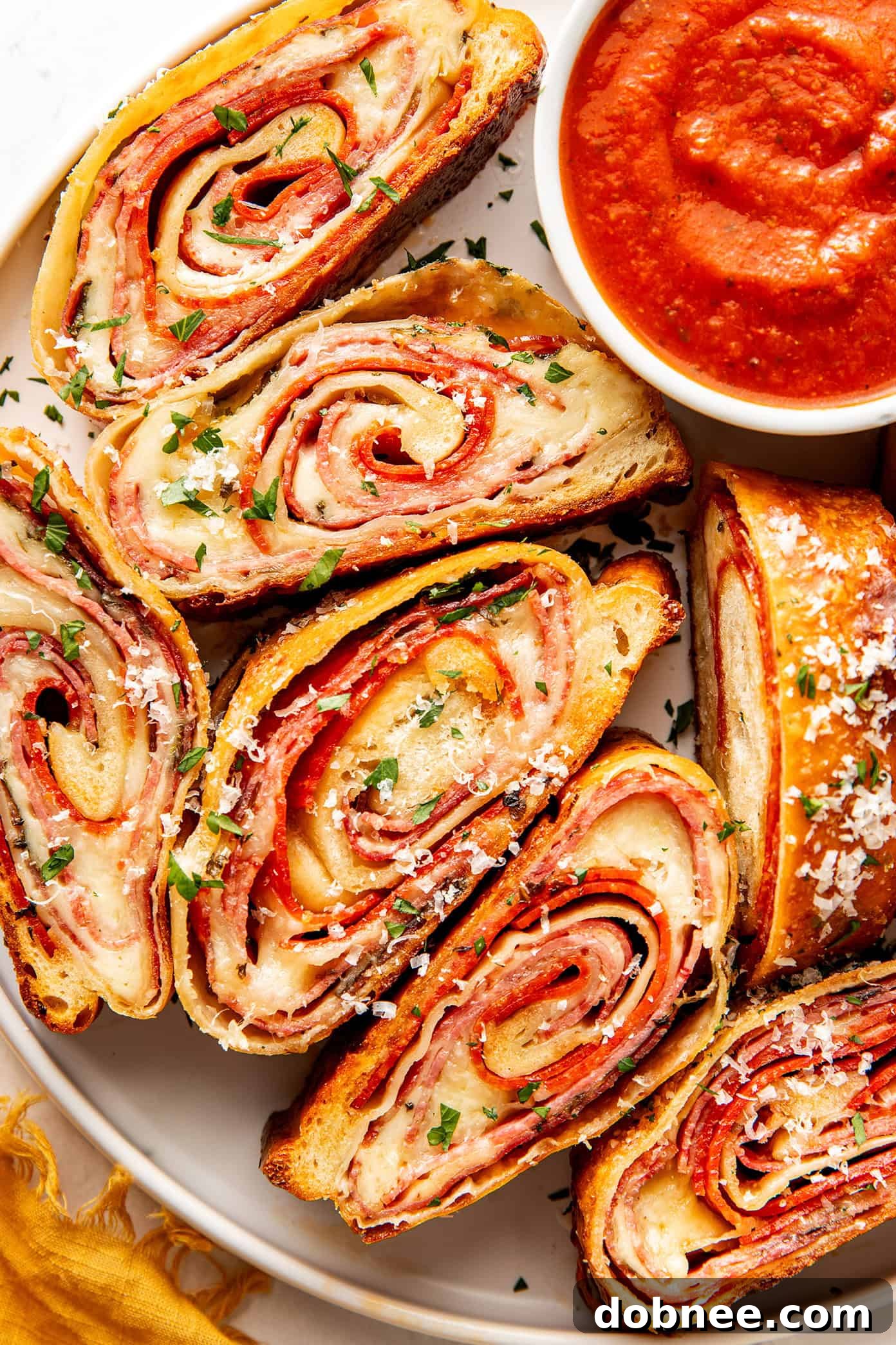 Golden brown homemade Stromboli, perfectly baked and ready to be sliced