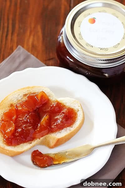 Close-up of freshly made Peach Earl Grey Jam in a jar