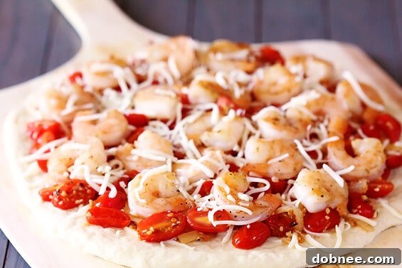 Freshly baked pizza with melted cheese and basil