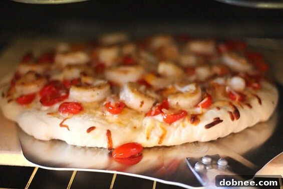 Close-up of Fra Diavolo shrimp topping on pizza