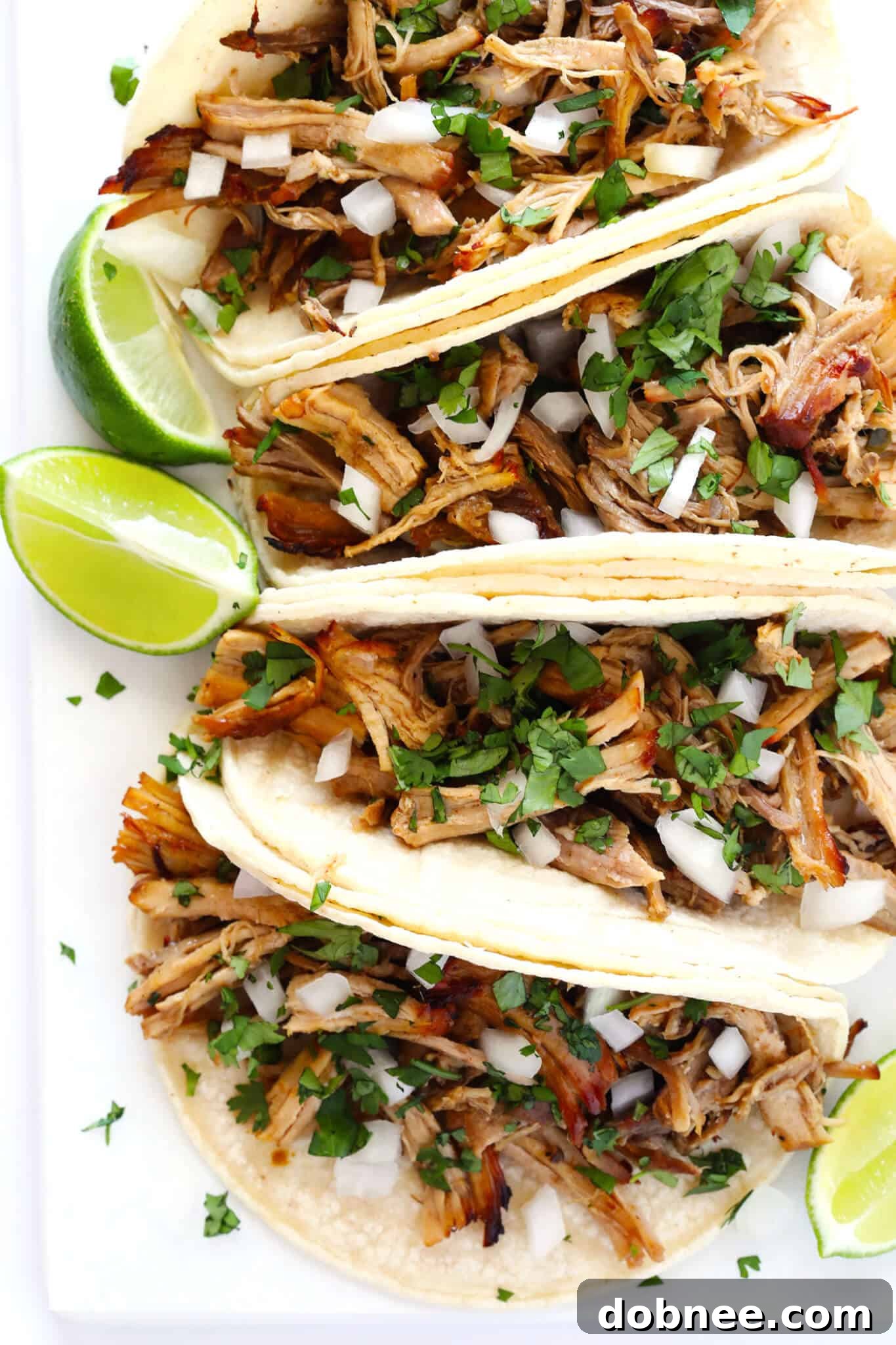 The BEST Slow Cooker Pork Carnitas! They're easy to make in the crock pot, made with my favorite Mexican seasonings, and so crispy and delicious! Perfect for tacos, enchiladas, salads, burritos, quesadillas and more. | gimmesomeoven.com