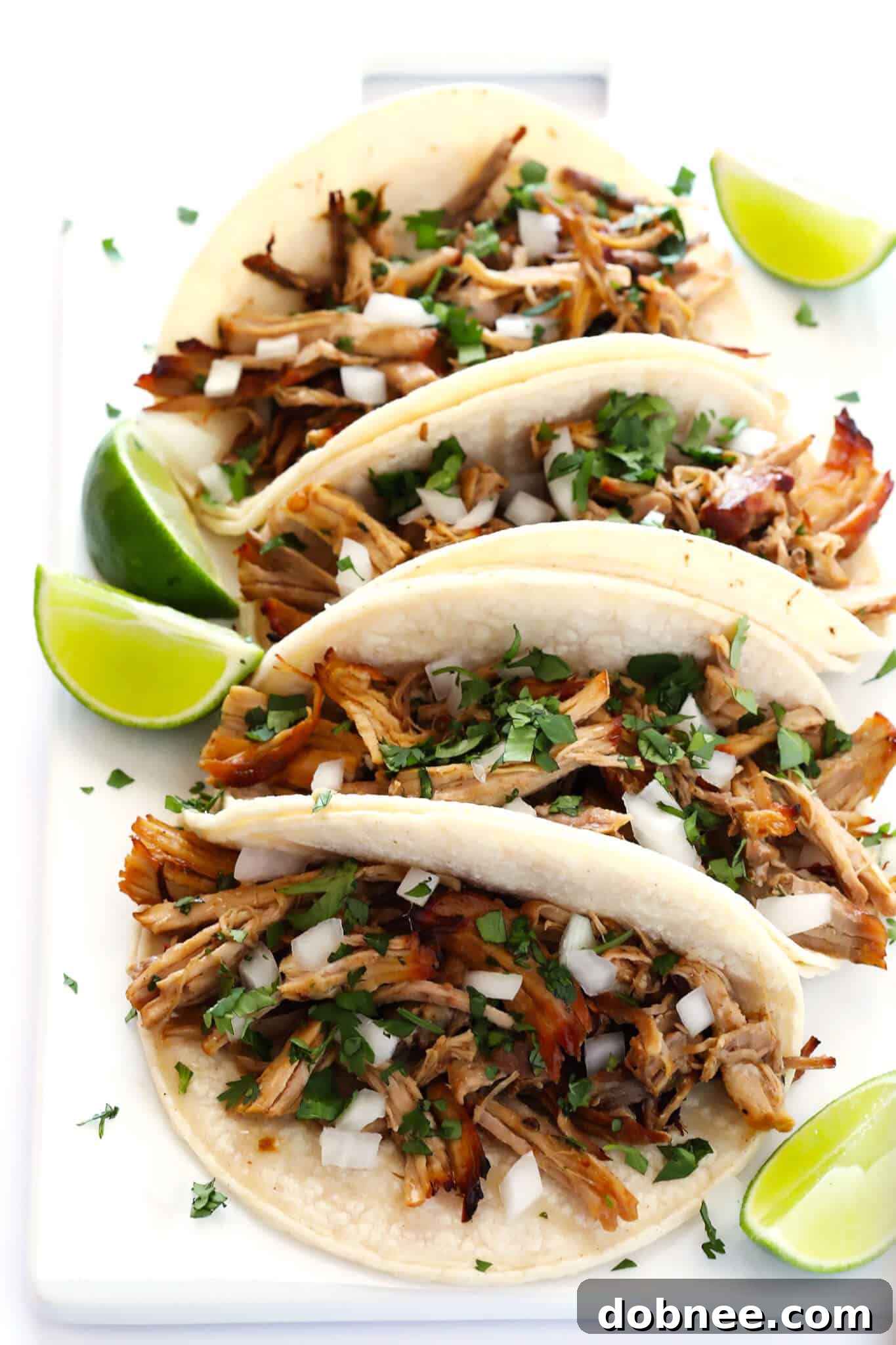 The BEST Slow Cooker Pork Carnitas! They're easy to make in the crock pot, made with my favorite Mexican seasonings, and so crispy and delicious! Perfect for tacos, enchiladas, salads, burritos, quesadillas and more. | gimmesomeoven.com