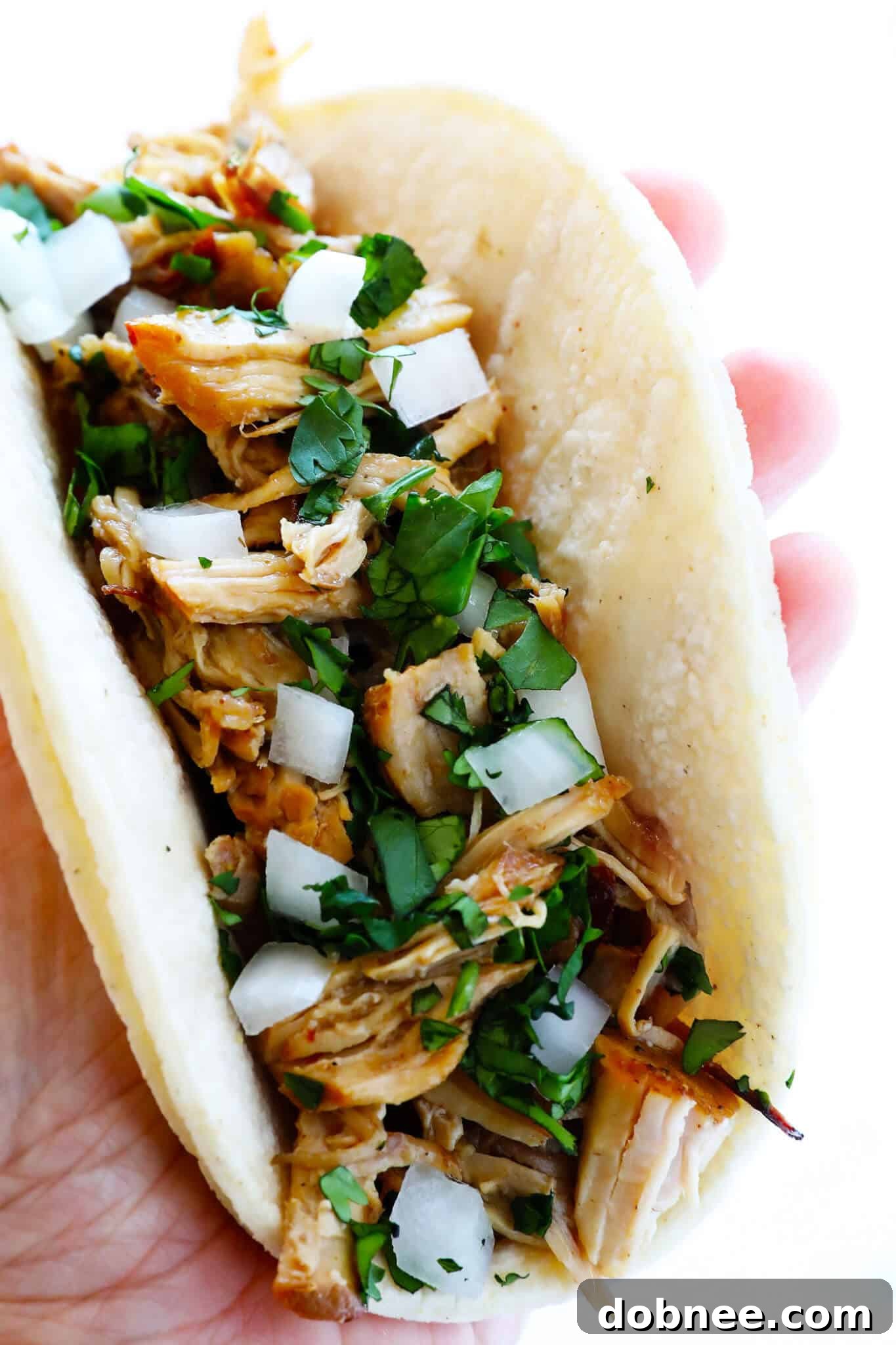 The BEST Slow Cooker Pork Carnitas! They're easy to make in the crock pot, made with my favorite Mexican seasonings, and so crispy and delicious! Perfect for tacos, enchiladas, salads, burritos, quesadillas and more. | gimmesomeoven.com