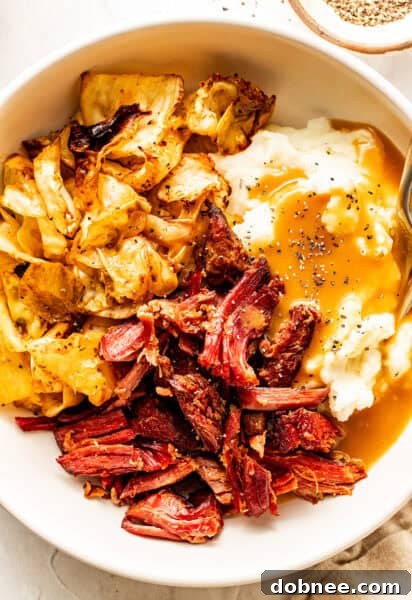 Carnitas-Style Corned Beef, slow-cooked and broiled for crispy edges.