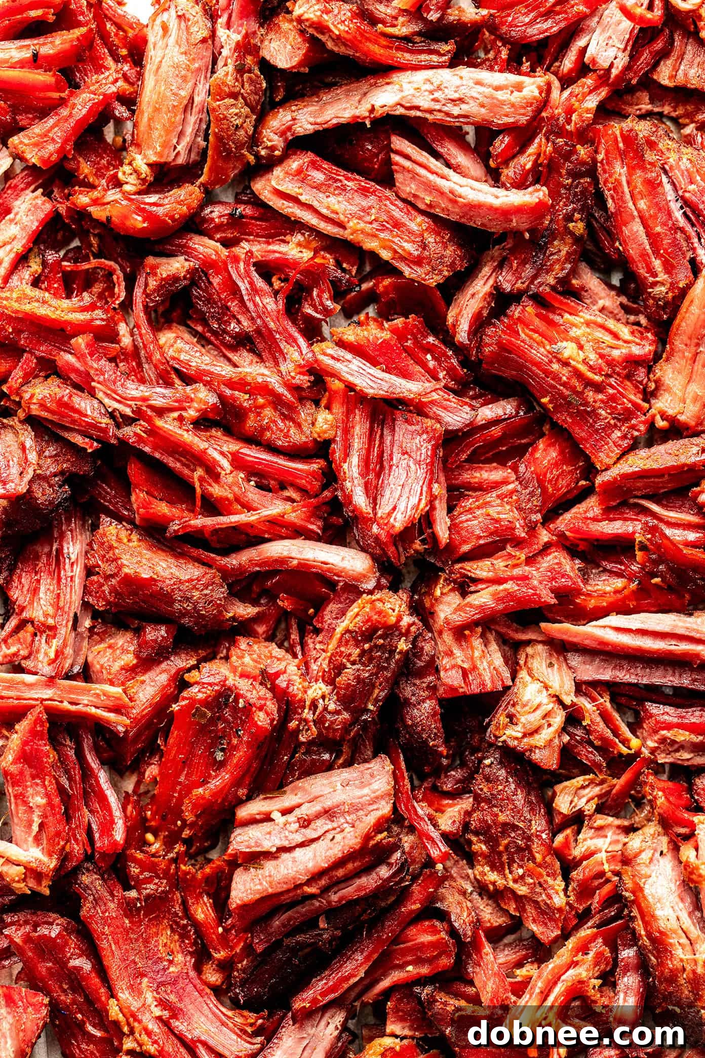 A full platter of Carnitas-Style Corned Beef surrounded by suggested side dishes.