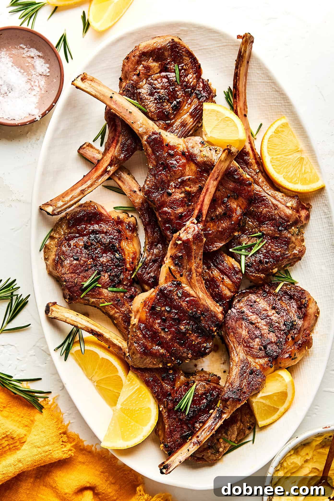 Perfectly grilled garlic rosemary lamb chops with lemon butter