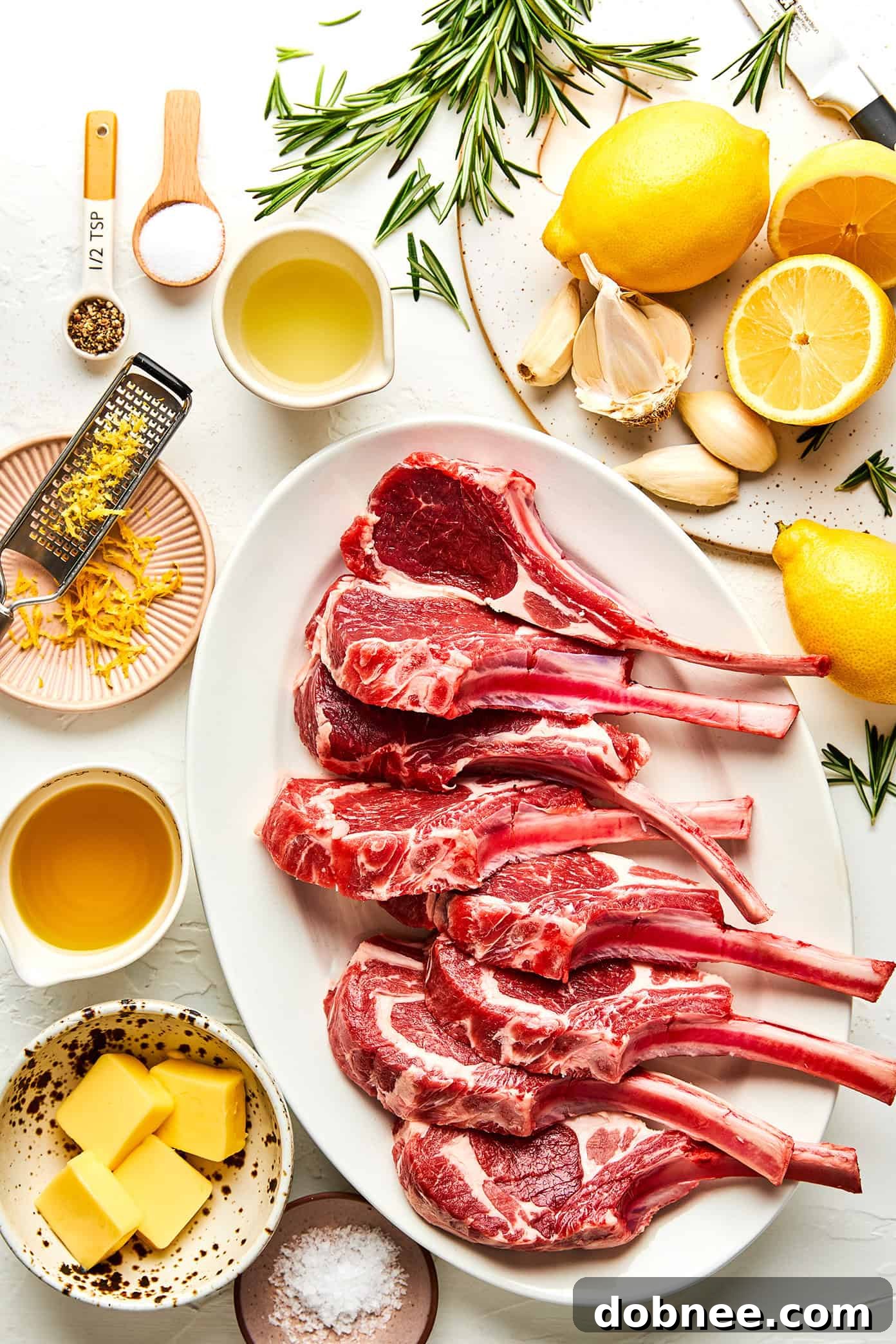 Grilled lamb chops resting on a cutting board
