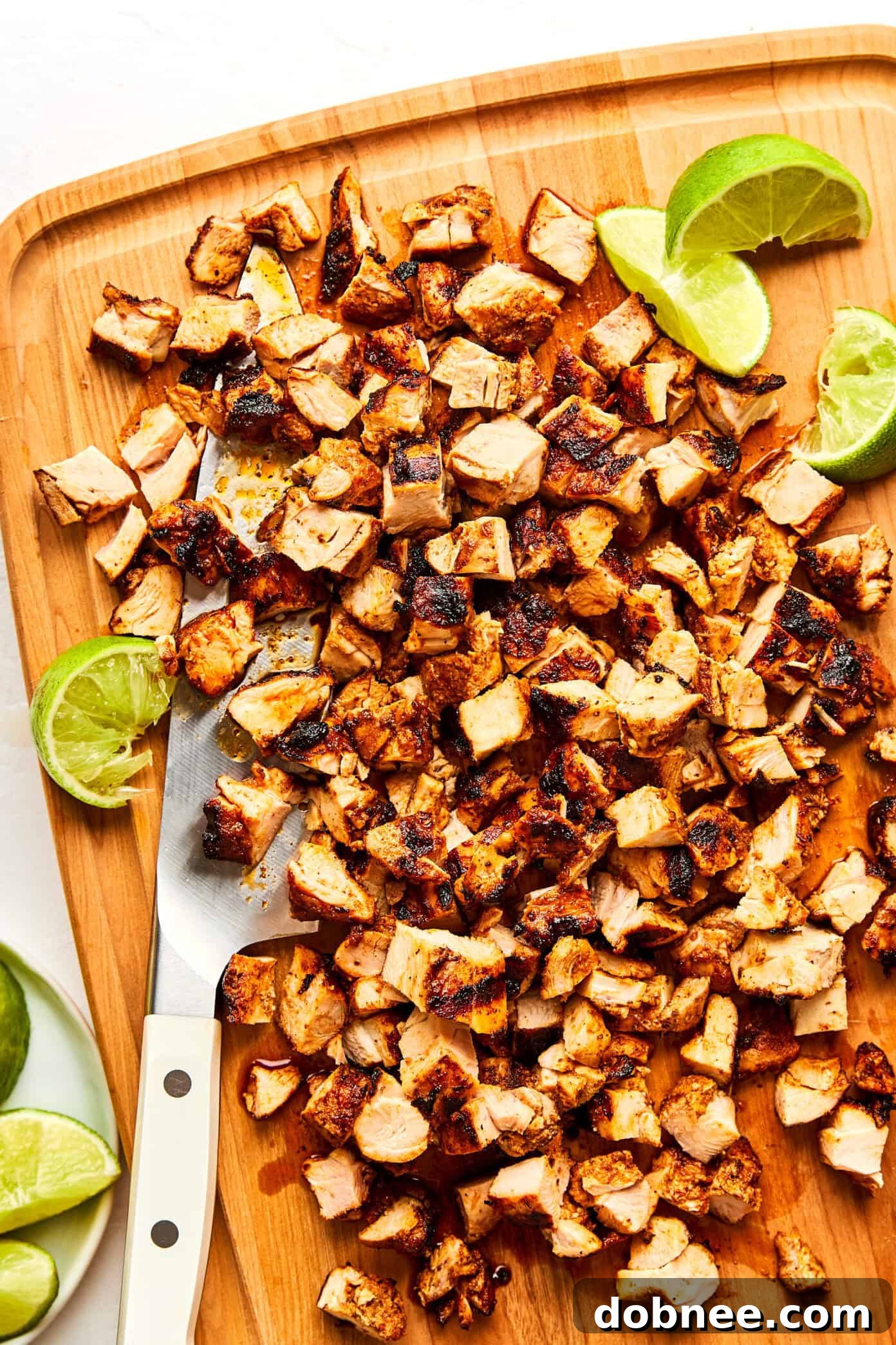 Deliciously charred homemade Chipotle Chicken, ready to be served in tacos or bowls.