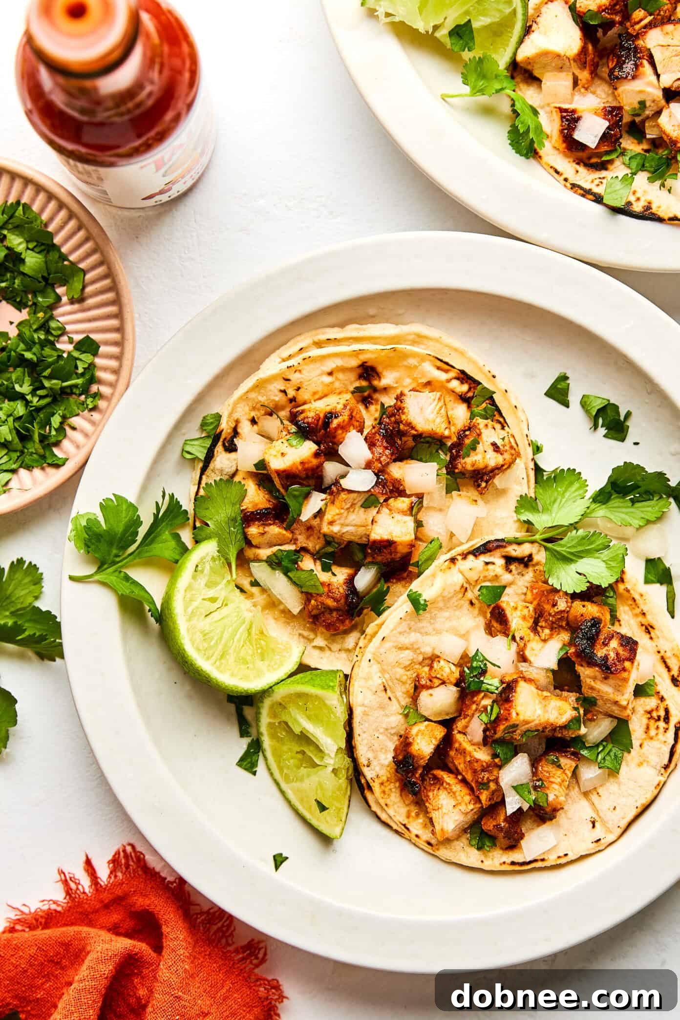 A spread of freshly prepared Chipotle chicken tacos, ready to be enjoyed.