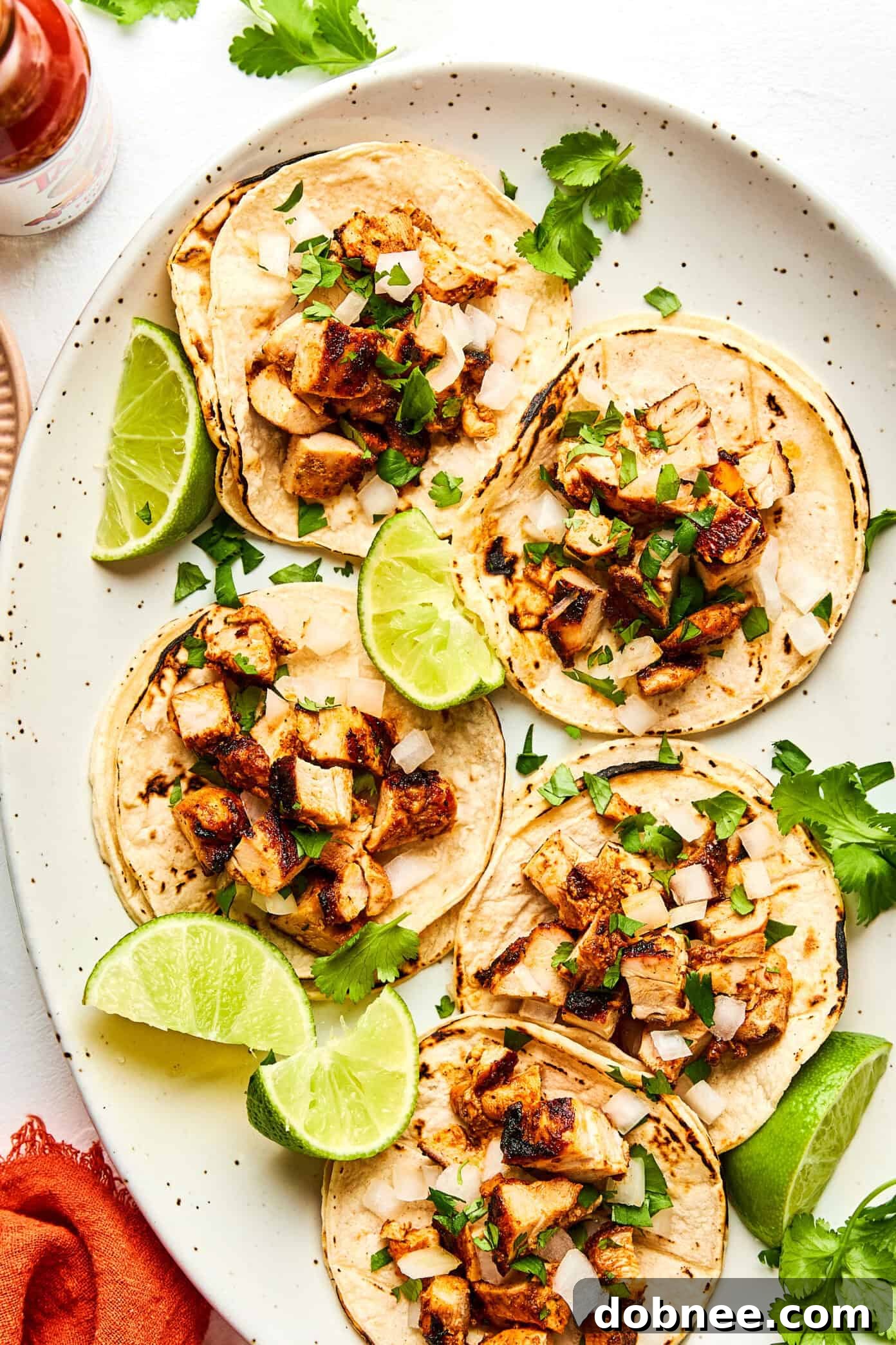 Variety of fresh salsas and toppings arranged for taco night.
