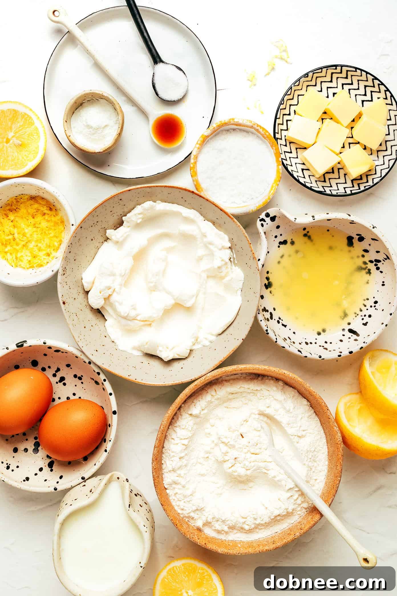 A bowl containing wet ingredients for the pancake batter, showing whisked eggs, ricotta, and milk.